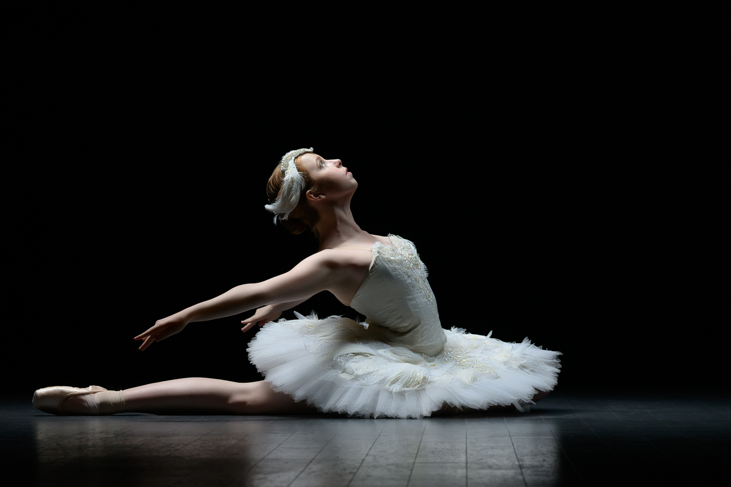 Teen Ballerina in White Swan Tutu
