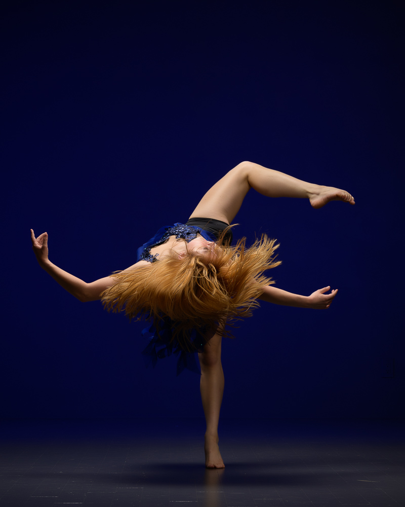 Contemporary Dancer layed out in rotating attitude